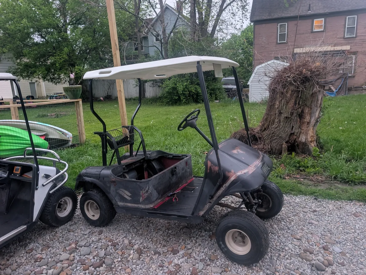The E-Z-GO as it arrived, tired and stock