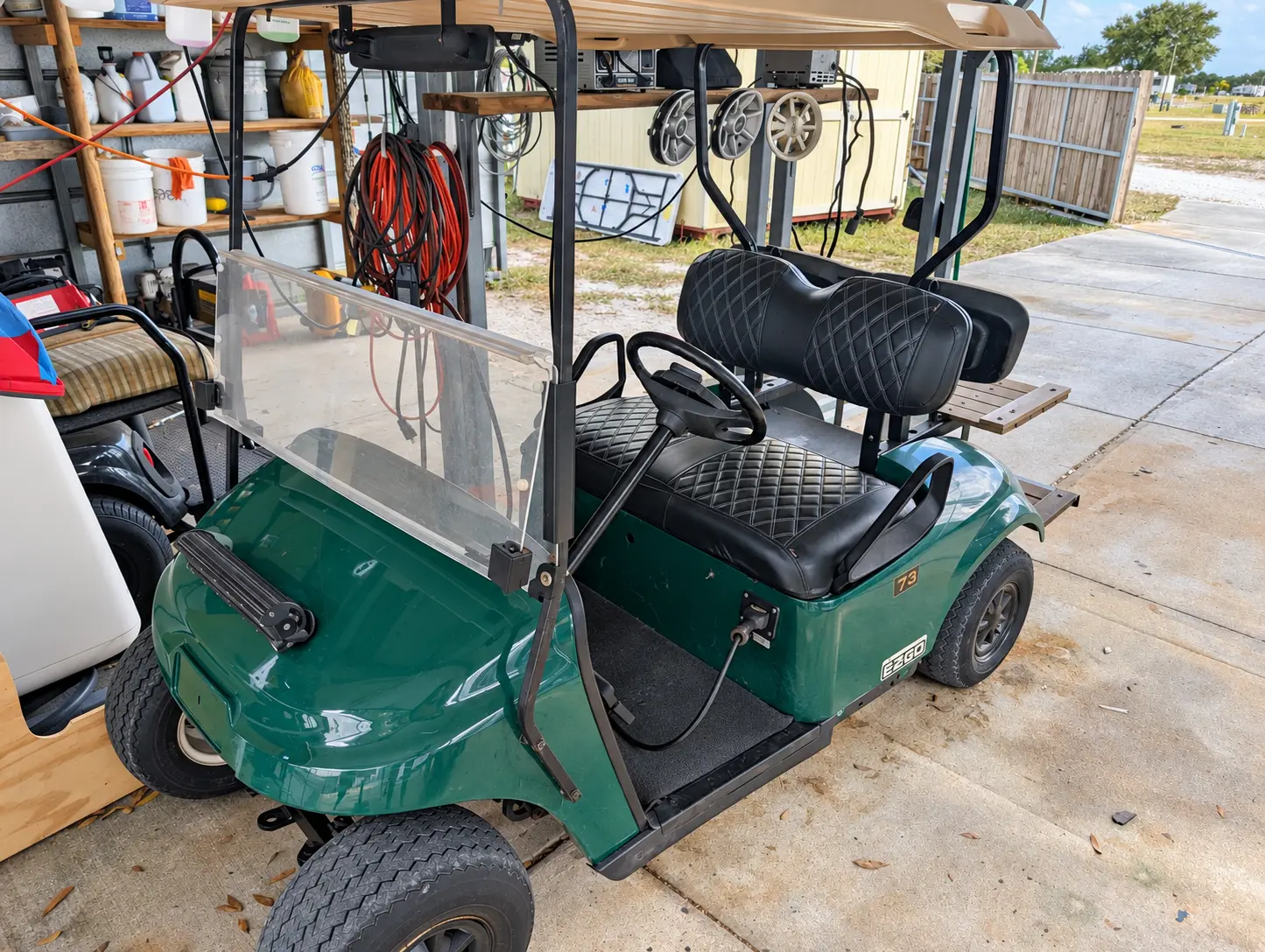 Restored green EZGO cart