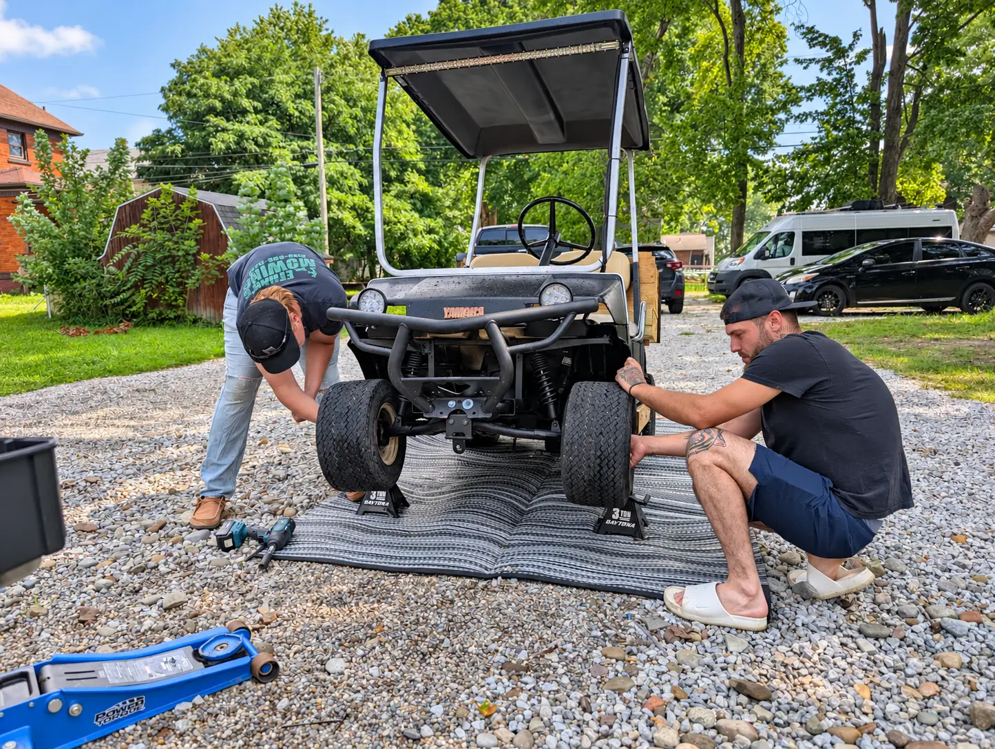 Front suspension work on a Yamaha cart